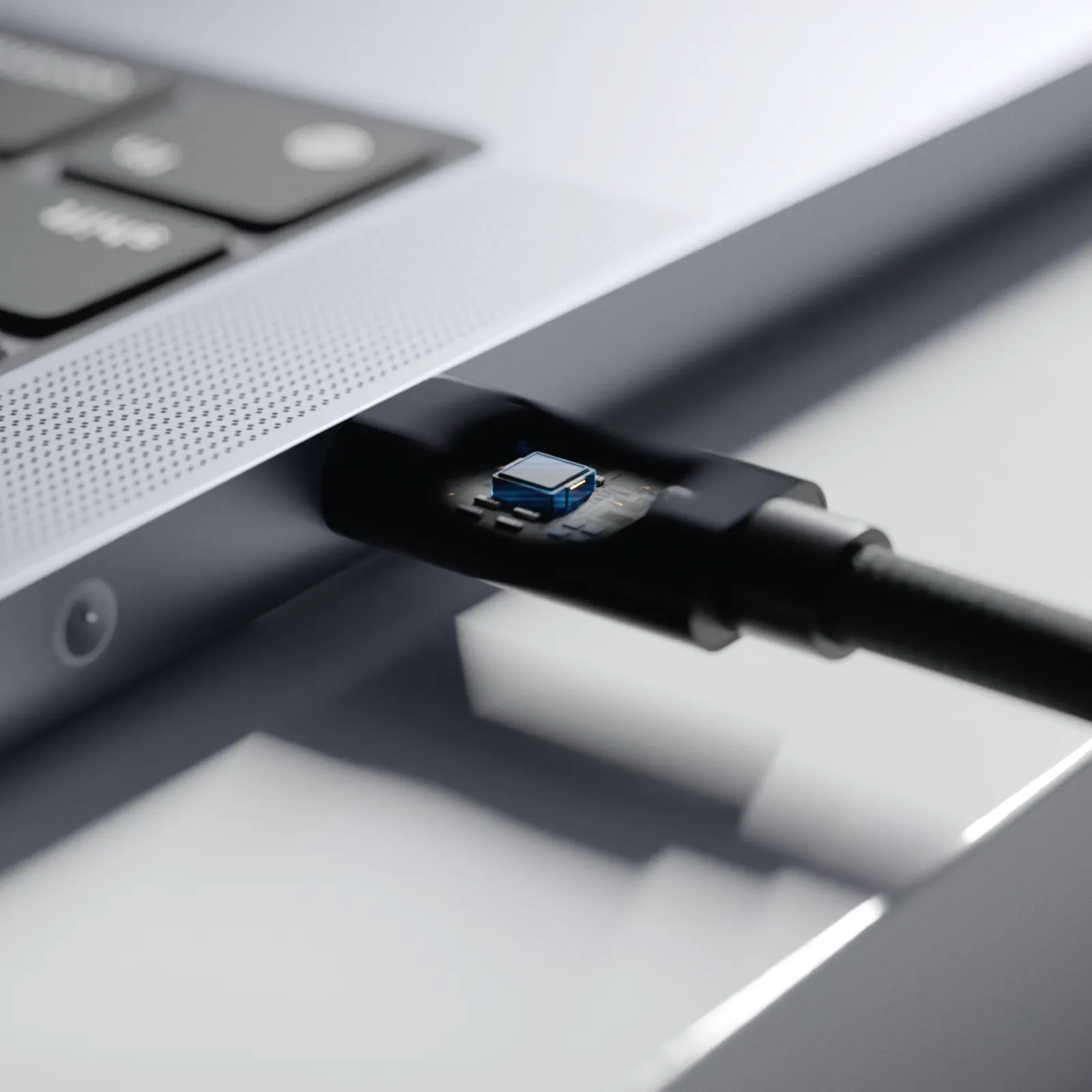 E-marker chip inside the connector, plugged into a laptop