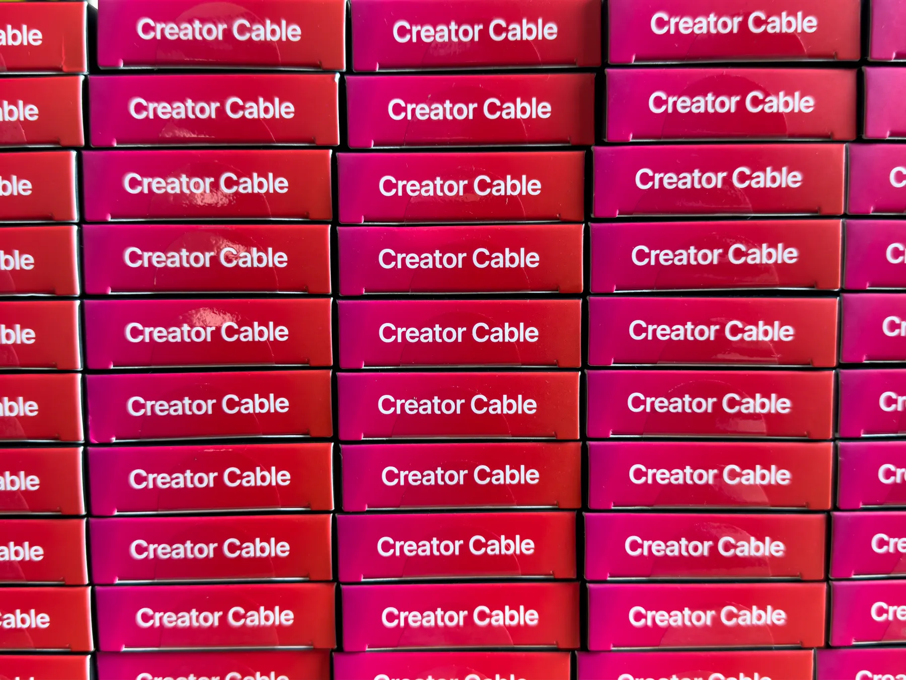Wall of red Creator Cable boxes